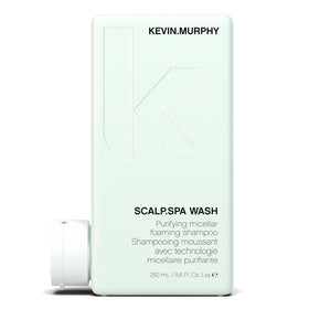 KEVIN.MURPHY SCALP.SPA WASH bottle on counter showing purifying scalp cleansing