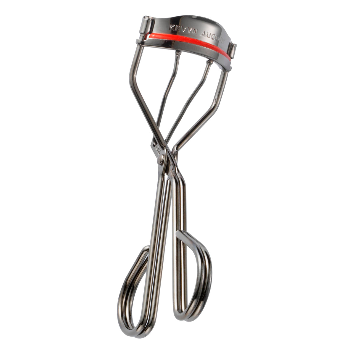 Kevyn Aucoin Eyelash Curler close-up with precise red pad for accurate placement.