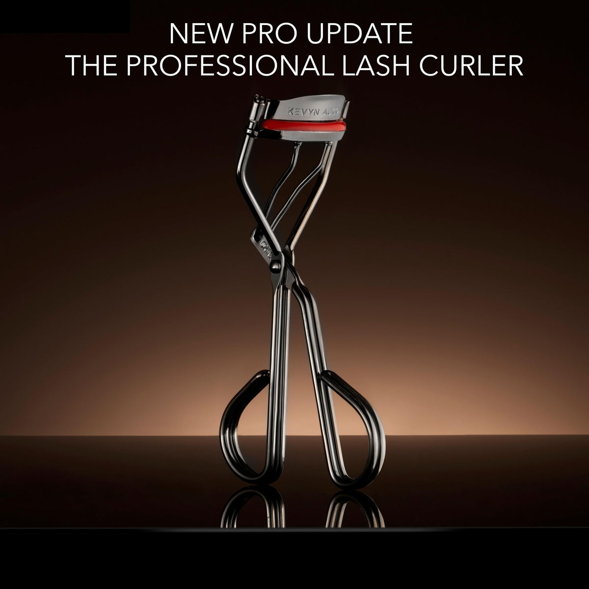 Kevyn Aucoin Eyelash Curler stainless steel handle with double-lined grip.