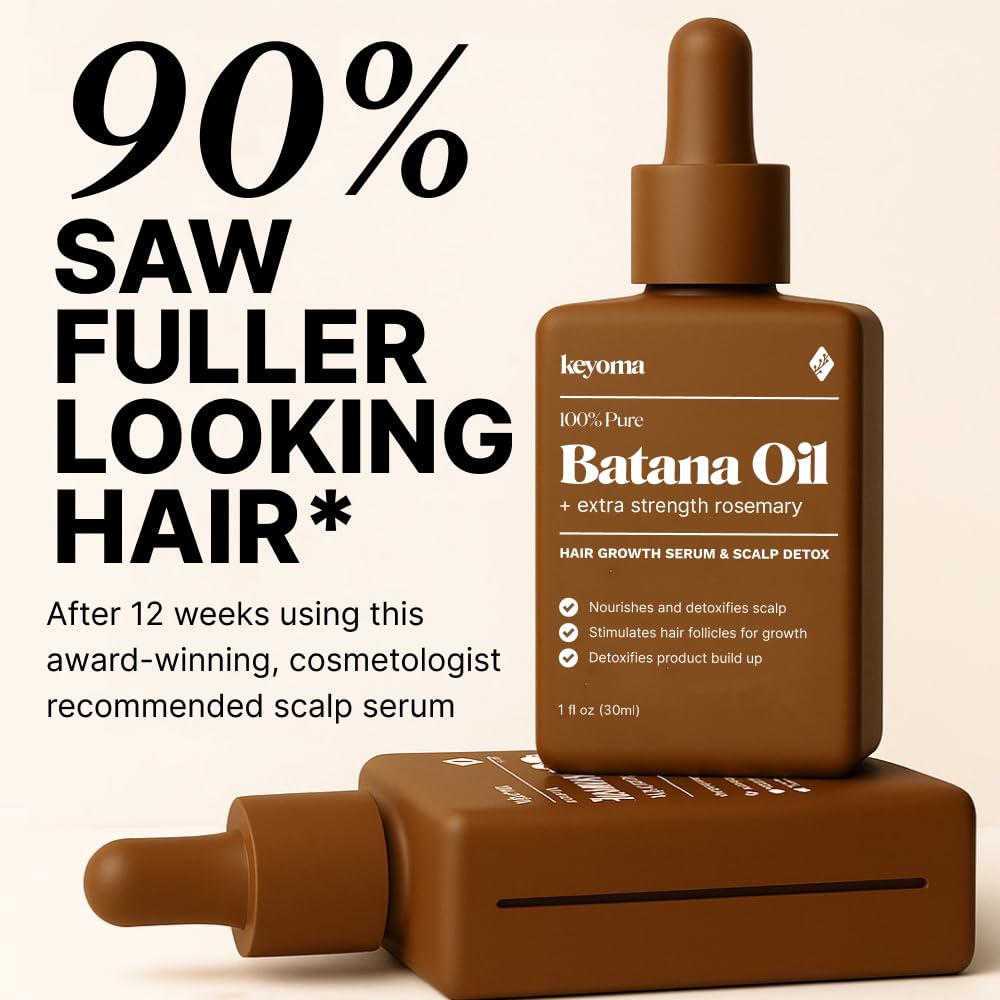 Applying Keyoma Batana Oil on hair for smoother, stronger strands.
