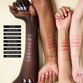 Keys Soulcare Comforting Tinted Lip Balm on lips gives subtle glow and moisture.