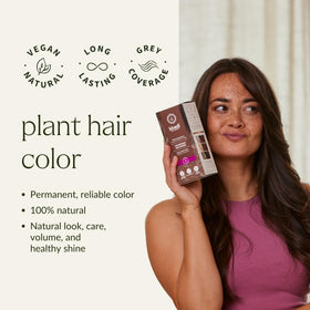 Applying KHADI Ash Brown color to hair for even, natural shading
