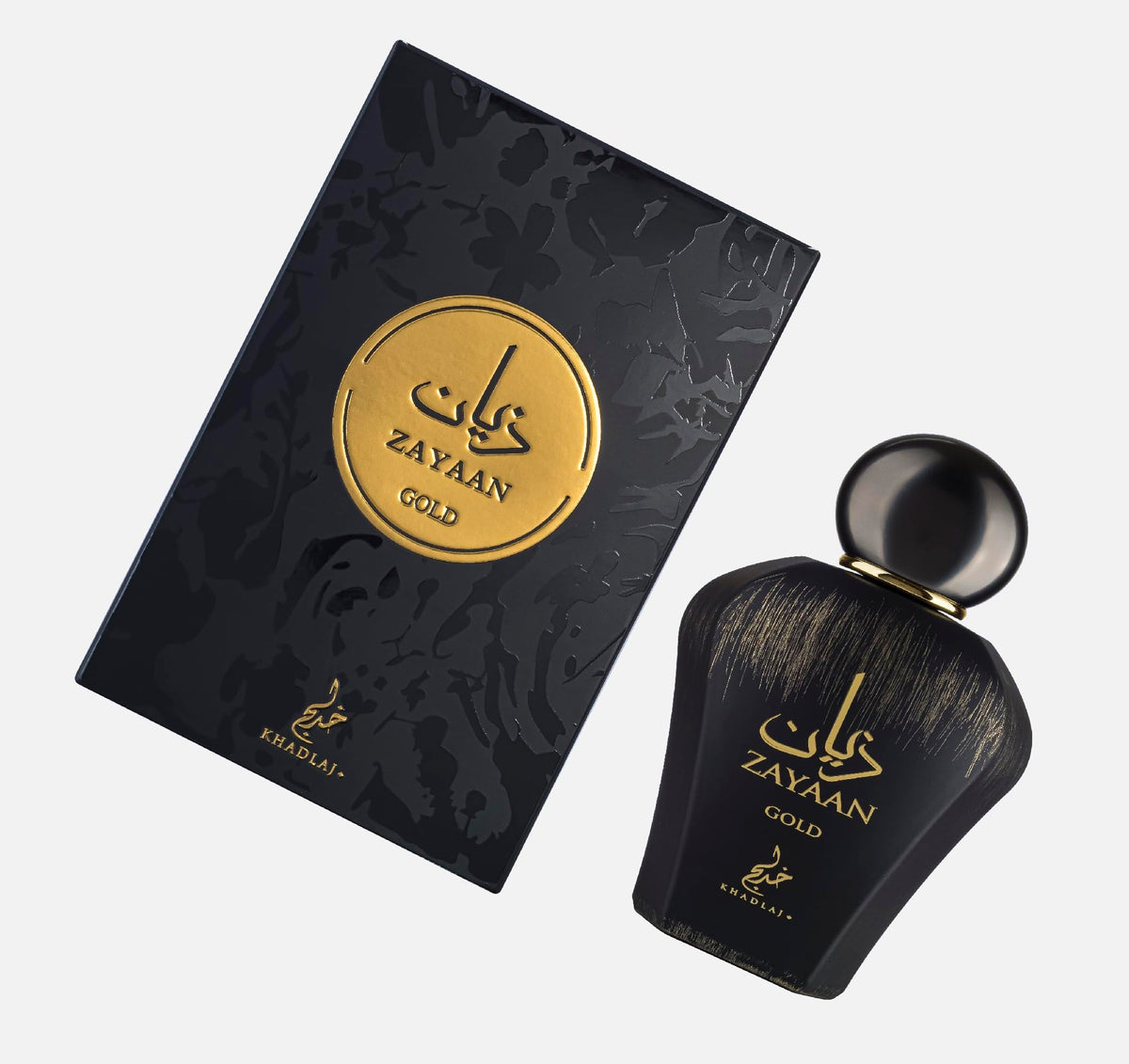 Khadlaj Zayaan Gold liquid in glass shows warm amber tones indicating lasting warmth