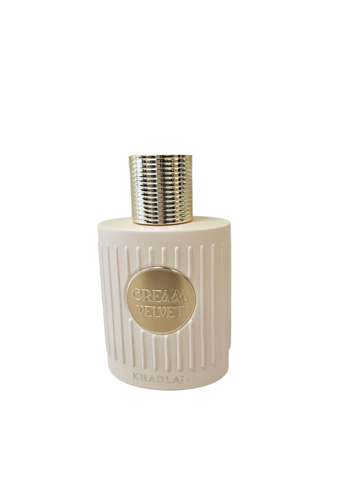 Cream Velvet bottle cap closeup reveals premium craftsmanship by KHADLAJ PERFUMES.
