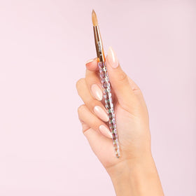 Kiara Sky Kolinsky brush #12 with iridescent crystal handle offers balanced, comfortable grip.
