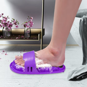 Kibhous purple foot scrubber in a standard shower setup.