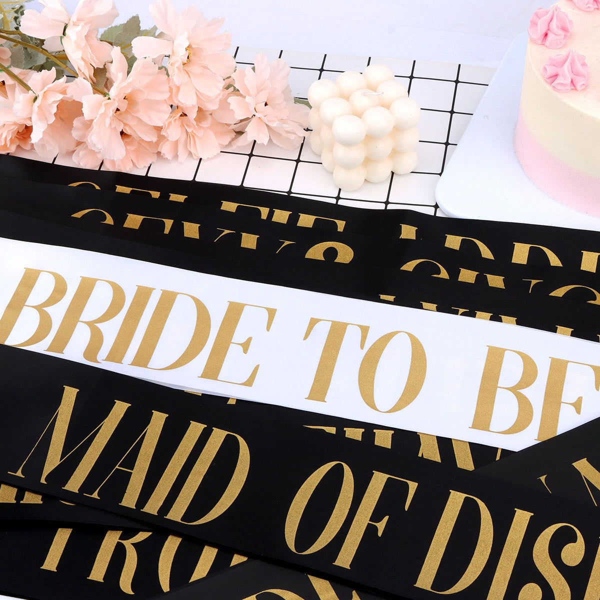 KICOSY party scene with gold lettering sashes for festive photos