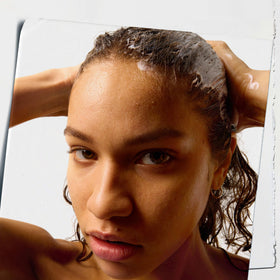 Kiehl's Amino Acid Conditioner on wet hair for easy two-minute treatment.
