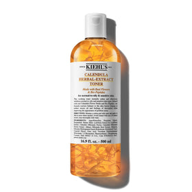Kiehl's Calendula Toner bottle on bathroom counter for soothing post-cleanse hydration.