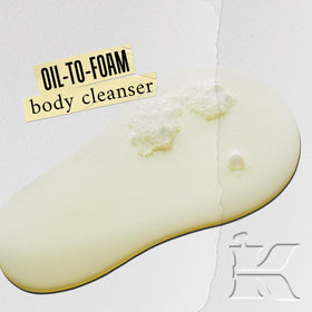 Close-up of light foam forming during shower with Kiehl's Creme de Corps cleanser for refreshed skin.