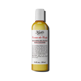 Kiehl's Creme de Corps bottle of oil-to-foam cleanser with vanilla almond scent for silky skin.