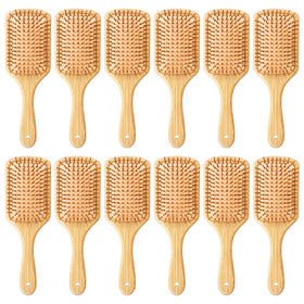 Kifmurase bamboo hair brush paddle for smooth detangling and ergonomic grip.