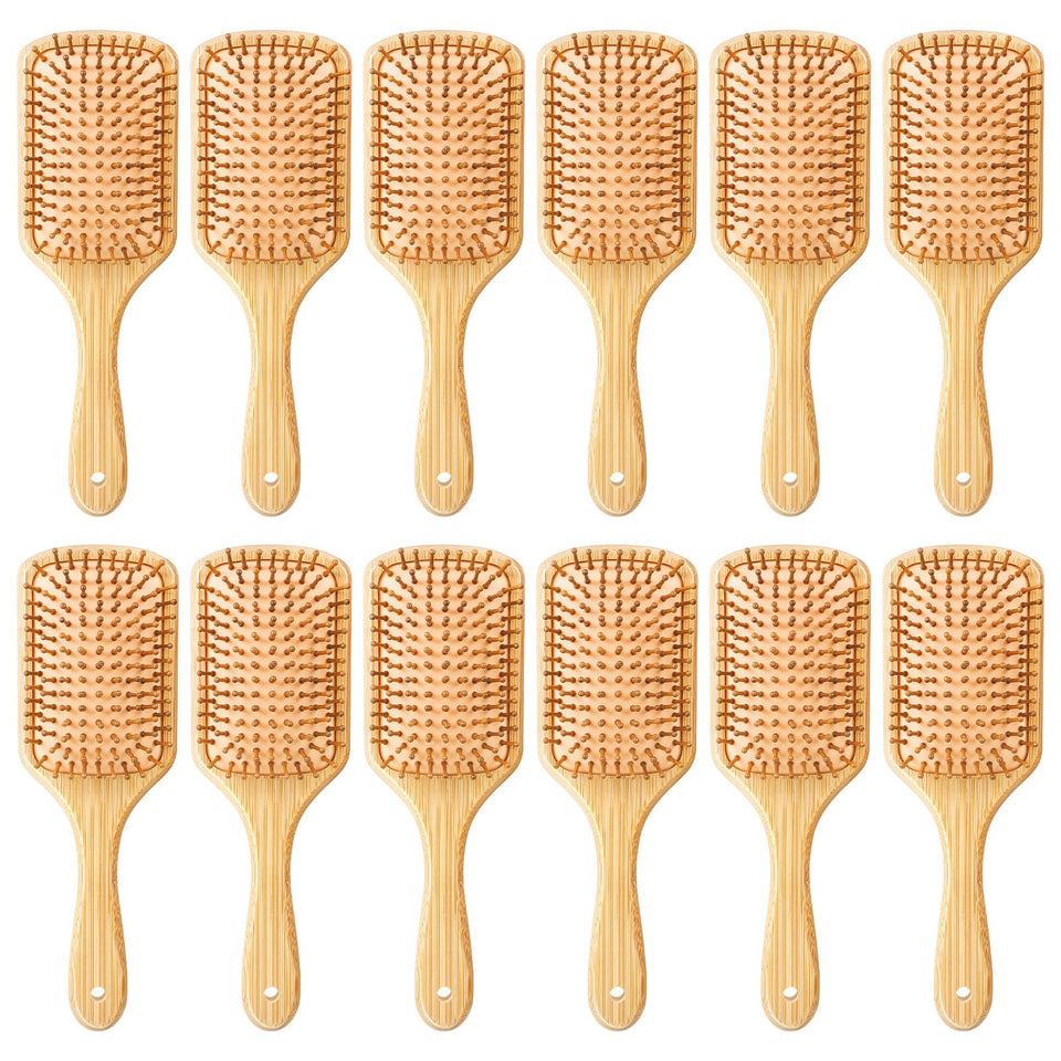Kifmurase bamboo hair brush paddle for smooth detangling and ergonomic grip.