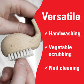 Kikkerland compact whale scrub brush in a bathroom setting for everyday cleaning.
