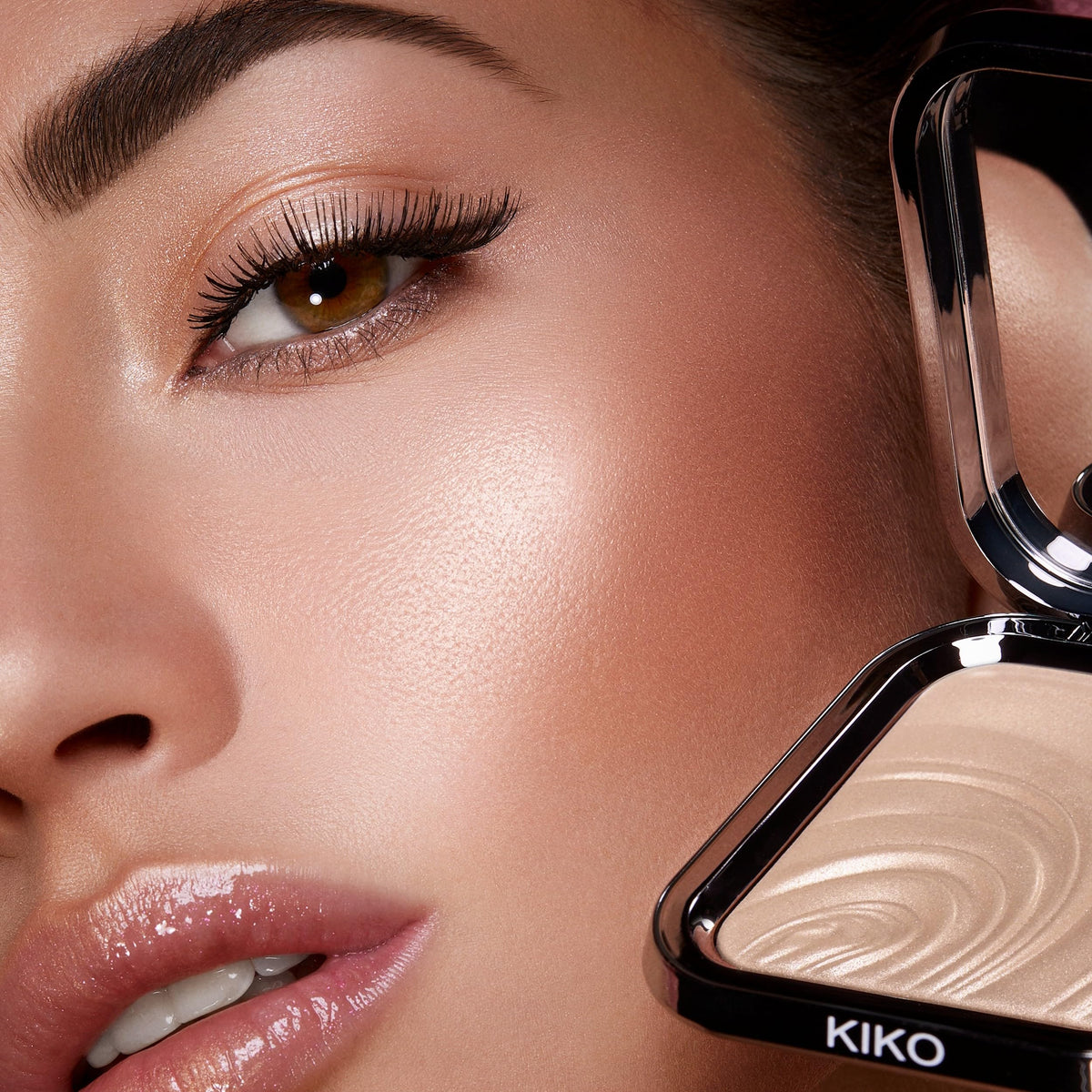 With KIKO MILANO Glow Fusion highlighter, apply to cheekbones for a tailored radiant lift