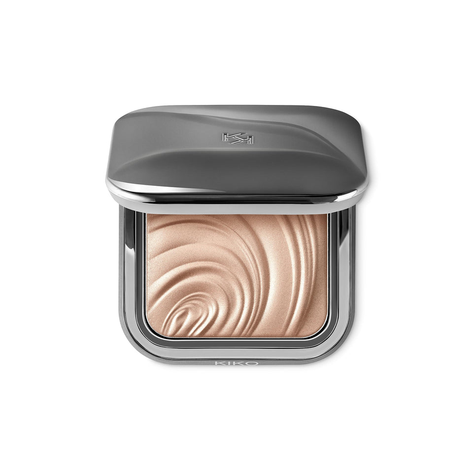 KIKO MILANO Glow Fusion highlighter with pearlescent finish highlighting cheekbones for radiant glow