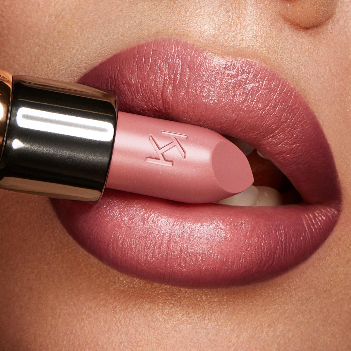 Kiko Milano Gossamer Emotion Lipstick 102 with shiny finish enhances a vibrant smile.