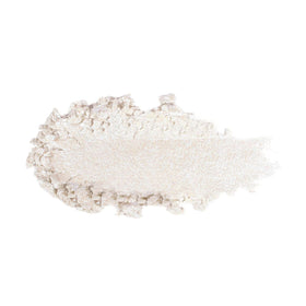 Decolletage glow from KimChiChic Pearl Gone Wild highlights neckline