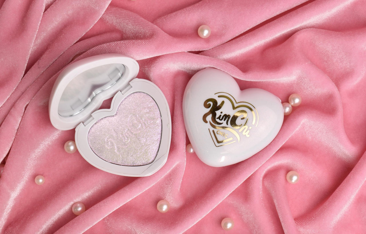 KimChiChic Pearl Gone Wild highlighter collarbone radiance for a subtle shimmer