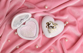 KimChiChic Pearl Gone Wild highlighter collarbone radiance for a subtle shimmer