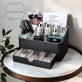 KINGFOM cosmetic storage for skincare bottles — tall bottles fit in large compartments.