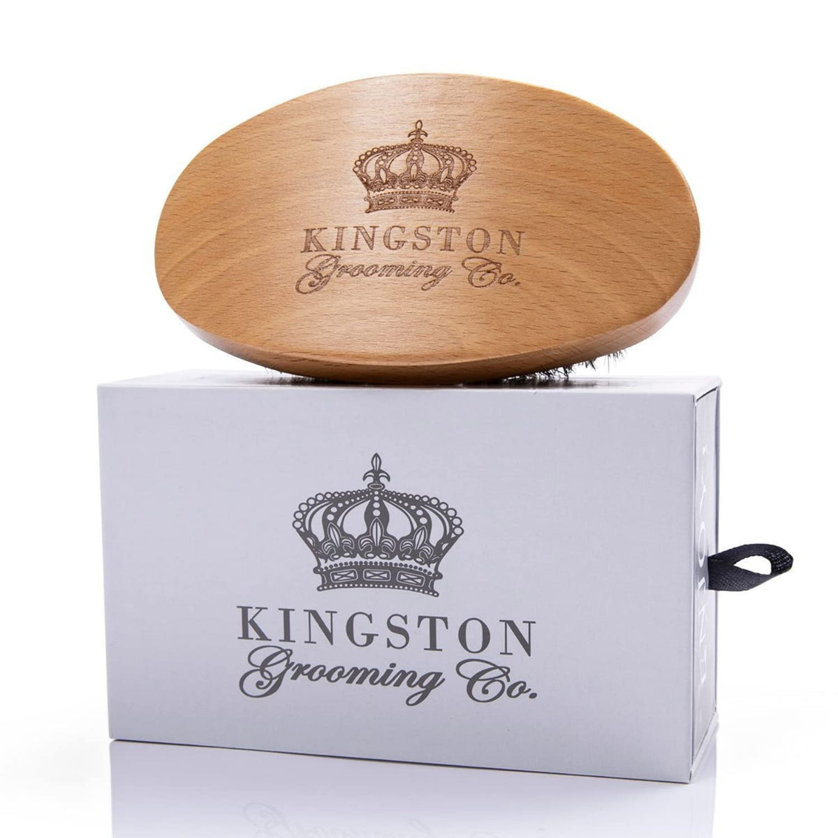 Kingston Grooming Co Original Wave Brush close-up shows soft boar bristles for gentle styling.