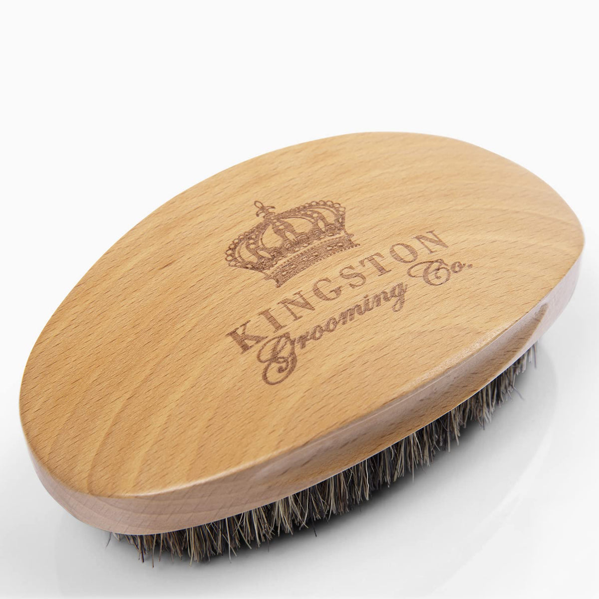 Kingston Grooming Co Original Wave Brush demonstrates a wave-friendly design for sleek waves.