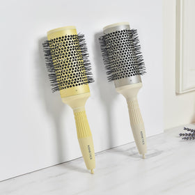 KISMETICS all hair types compatibility supports versatile brush styling.