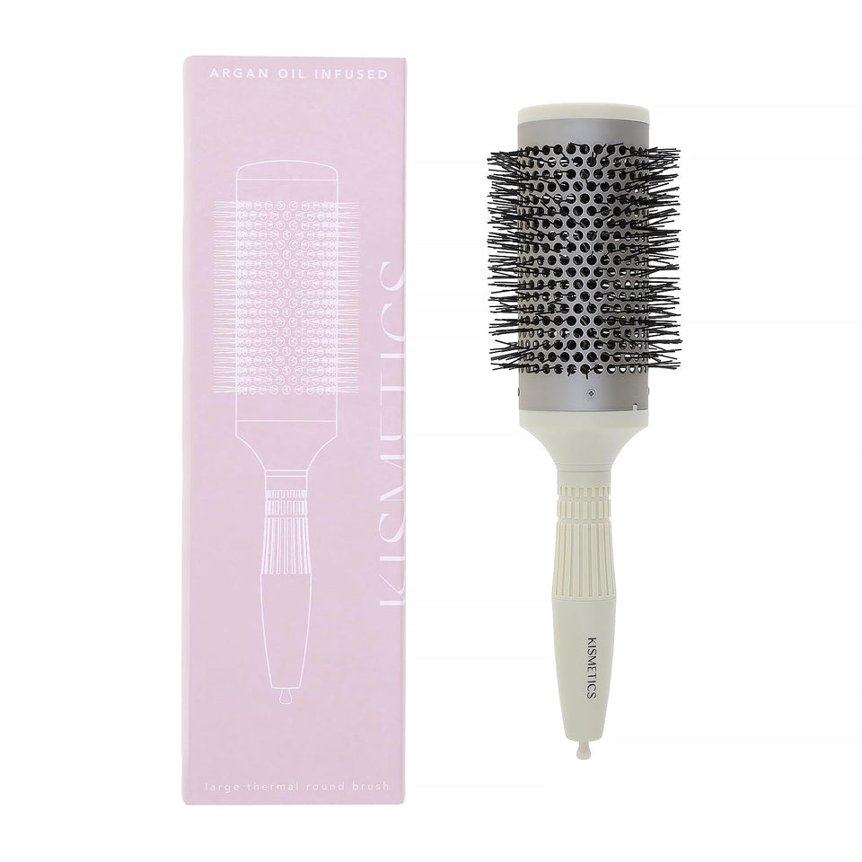 KISMETICS fast dry round brush with ceramic barrel for quick styling and smooth results.