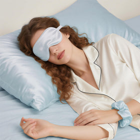 KISMETICS travel-friendly packaging of vegan silk sleep set