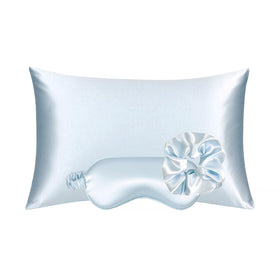 KISMETICS vegan silk pillowcase light blue close-up shows smooth finish and skin-friendly touch