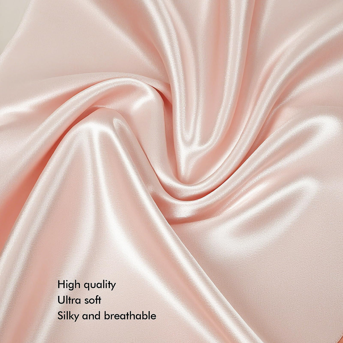KISMETICS vegan silk sleep set on bed in light pink inviting restful ritual
