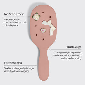 KitschPop paddle brush lightweight with ergonomic handle for everyday use.