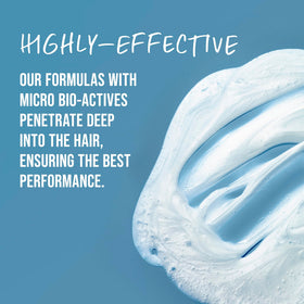 Hands lathering KMS MoistRepair Shampoo to cleanse dry, weak hair for moisture.