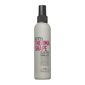 KMS ThermaShape Hot Flex Spray bottle demonstrates flexible hold for heat styling.