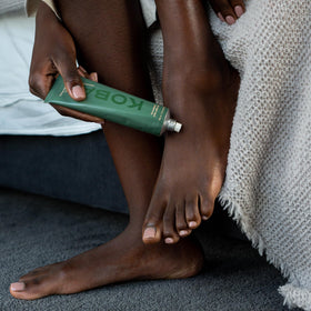 KOBA Bottom Up Foot Cream on dry feet shows potential softening after use.