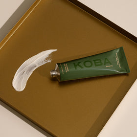 Fragrance notes of KOBA Bottom Up Foot Cream with lemon, cardamom, rose, vetiver.