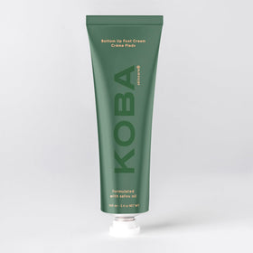 Close-up of KOBA Bottom Up Foot Cream texture showing a rich non sticky formula.