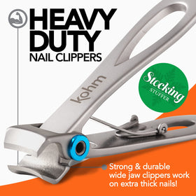 KOHM clippers in hand demonstrate ergonomic grip for comfortable daily use.