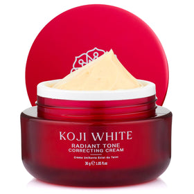 Koji White bottle displaying 1% Kojic Acid Cream for even-toned skin.