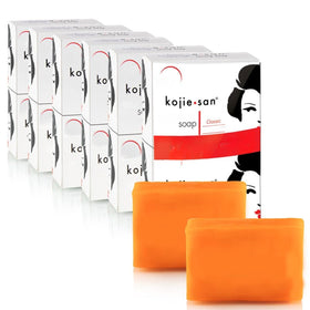 Kojie San skin brightening soap bar unwraps with orange scent for radiant skin.