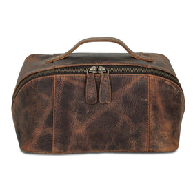  KomalC leather Dopp kit with zipper divider secures razors and brushes during trips.