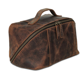 KomalC luxury leather toiletry bag main compartment keeps essentials organized on travel.