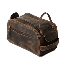 KomalC travel toiletry bag water-repellent lining protects contents from spills.