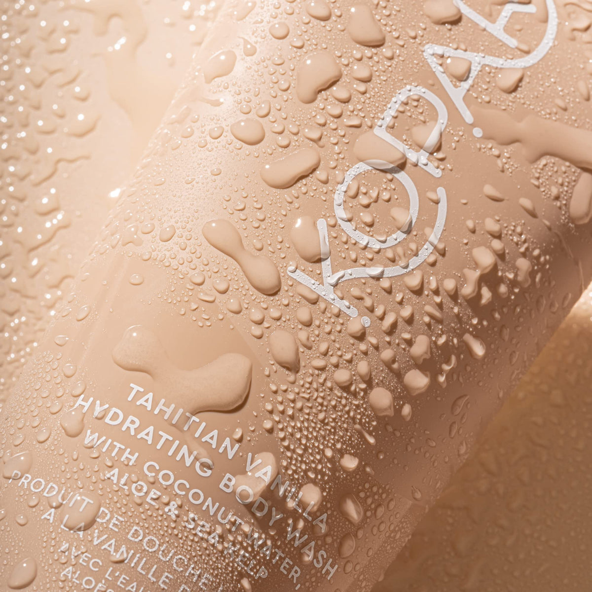Kopari Coconut Water Aloe bottle pour highlights soothing, skin-friendly care.