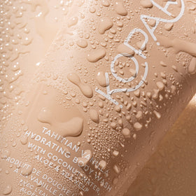Kopari Coconut Water Aloe bottle pour highlights soothing, skin-friendly care.