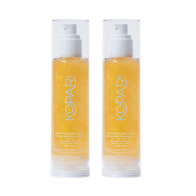 Kopari Sun Shield Body Glow bottle pour with sun-kissed glow and SPF
