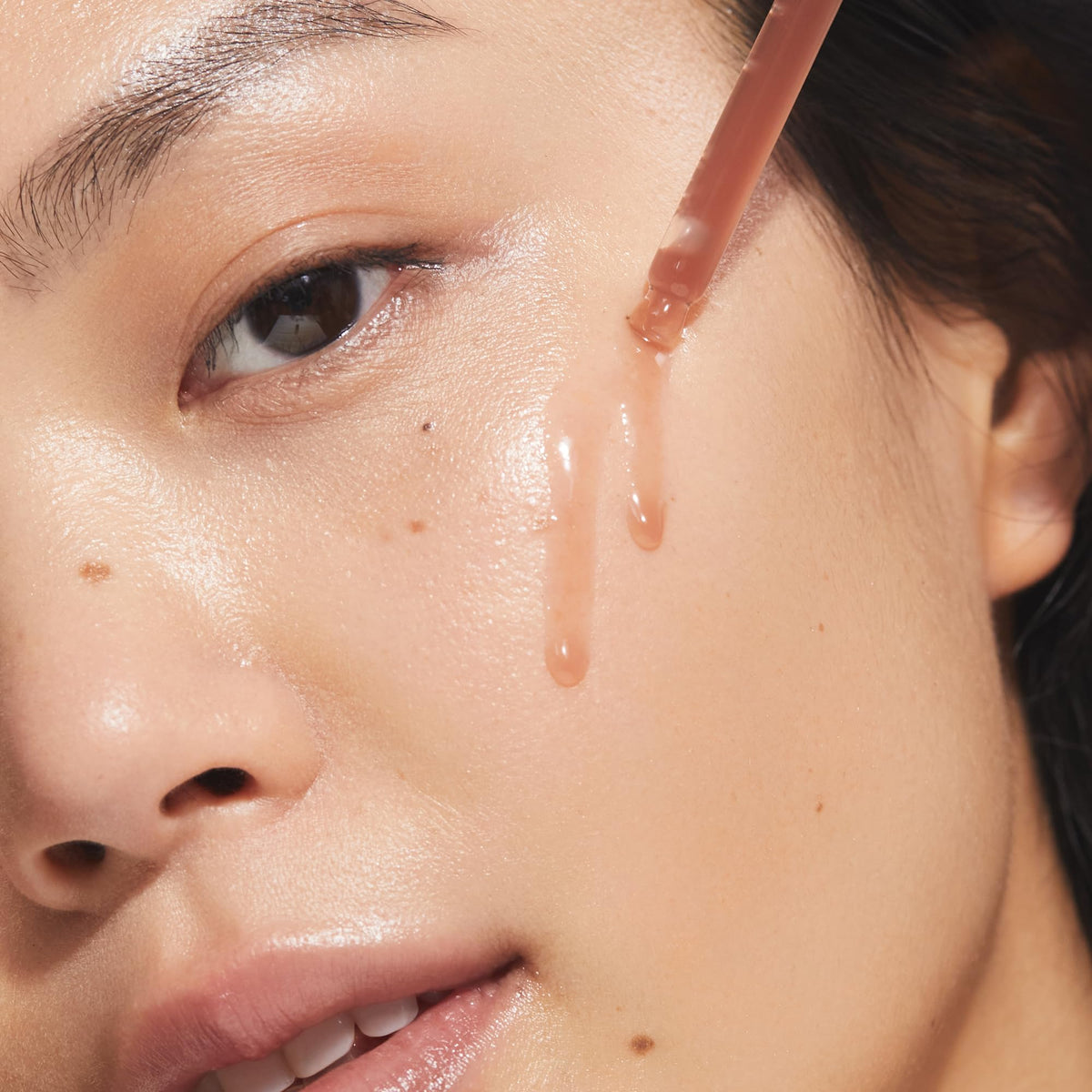 KORA Organics Turmeric Glow Drops turmeric-rich formula close-up of ingredients.