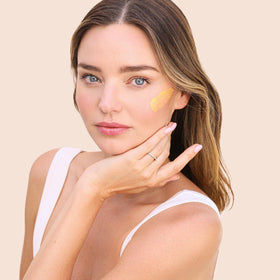 KORA Organics application cue showing pearl-sized amount for day and night use.