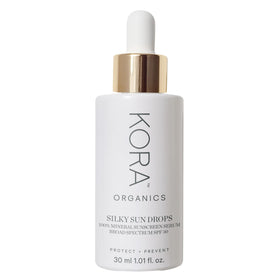 KORA Organics Silky Sun Drops bottle front showing portable sunscreen serum for on-the-go protection